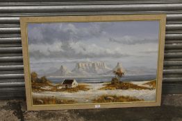 A FRAMED OIL ON BOARD OF A TABLE MOUNTAIN - SIGNED LOWER LEFT - H 60 CM BY W 90 CM