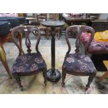 A PAIR OF VICTORIAN CHAIRS WITH A TORCHERE STAND