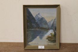 A FRAMED OIL ON BOARD OF A MOUNTAINOUS LAKE SCENE BY COLLEEN HAMILTON (NEW ZEALAND ARTIST) - H 24.