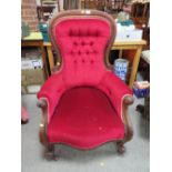 A LARGE VICTORIAN MAHOGANY GENTLEMANS ARMCHAIR