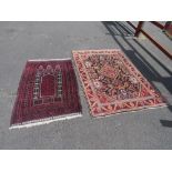 TWO EARLY 20TH CENTURY RED/PINK WOOLLEN RUGS, LARGEST 208 X 136 CM , SMALLEST 163 X 96 CM(2)