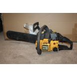 A PARTNER 370 YELLOW CHAIN SAW, WITH INSTRUCTIONS