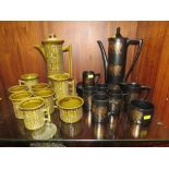 A PORTMEIRION GOLD LION COFFEE SET DESIGNED BY SUSAN WILLIAM ELLIS TOGETHER WITH A PORTMEIRION GREEN