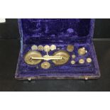 A BOXED SET OF SOVEREIGN SCALES AND WEIGHTS