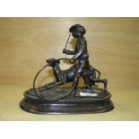A BRONZE OF A MAN AND DOG SIGNED J. MOIGVIER ? - W 22 CM