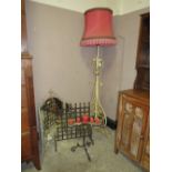 AN ANTIQUE PAINTED WROUGHT IRON LAMP STANDARD, WITH A TRIPLE MIRROR, CANDLE STAND AND PORTCULLIS