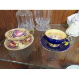 TWO AYNSLEY ORCHARD GOLD TEA CUPS AND SAUCERS WITH FRUIT PATTERN INTERIORS