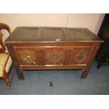 A LATE 17TH EARLY 18TH CENTURY CARVED OAK TRIPLE PANEL COFFER H-73 W-114 CM A/F