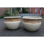 A PAIR OF MODERN CONCRETE CIRCULAR PLANTERS DIA. 47 CM TOGETHER WITH ANOTHER (3)