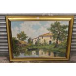 A LARGE GILT FRAMED OIL ON CANVAS DEPICTING A RIVERSIDE BUILDING WITH FIGURES AND CHICKENS IN THE