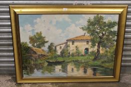 A LARGE GILT FRAMED OIL ON CANVAS DEPICTING A RIVERSIDE BUILDING WITH FIGURES AND CHICKENS IN THE