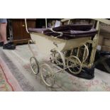 A VINTAGE SWALLOW CHILDS PRAM TOGETHER WITH A FLATPACK CRADLE (2)