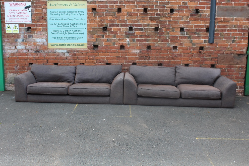 A PAIR OF GREY / BROWN UPHOLSTERED THREE SEATER SETTEES - NO FEET, W 218 CM, D 95 CM, SEAT HEIGHT 35