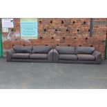 A PAIR OF GREY / BROWN UPHOLSTERED THREE SEATER SETTEES - NO FEET, W 218 CM, D 95 CM, SEAT HEIGHT 35