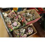 A QUANTITY OF FLORAL CERAMIC ORNAMENTS ETC