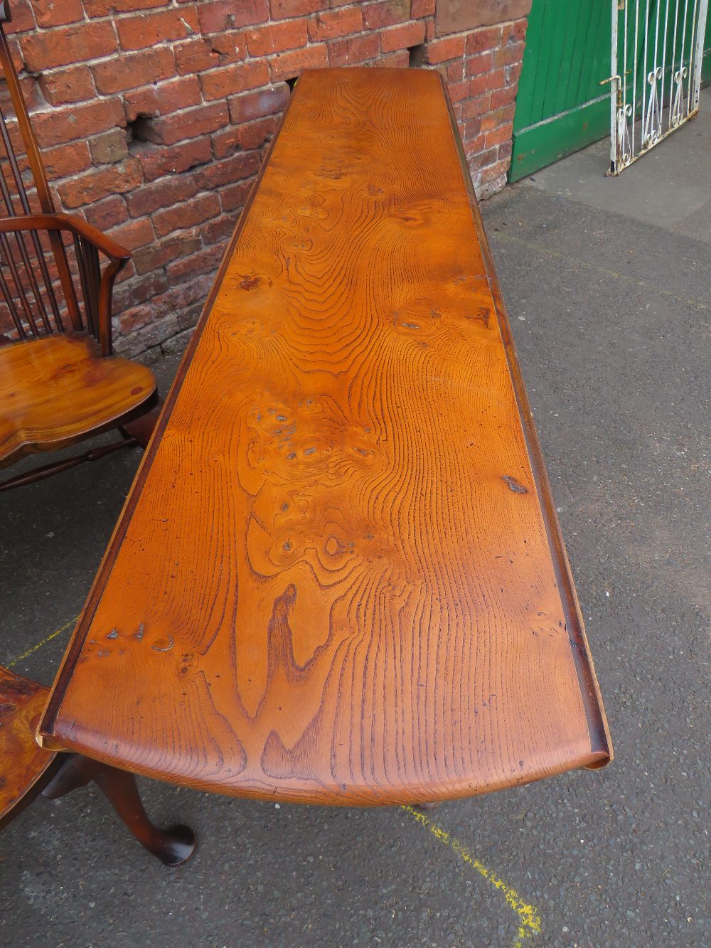 A LARGE STEWART LINFORD BESPOKE BURR ELM AND YEW OVAL DROPLEAF TABLE, with typical gateleg - Image 2 of 3