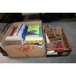 TWO BOXES OF ASSORTED VINTAGE AND MODERN BOOKS TO INCLUDE AN ANTIQUE LEATHER BOUND HOLY BIBLE A/F,