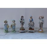 FIVE ASSORTED CERAMIC FIGURES TO INCLUDE A PAIR OF CONTINENTAL STYLE EXAMPLES