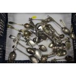 A COLLECTION OF ASSORTED TEASPOONS TO INC SILVER HANDLED BOTTLE OPENER