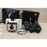 A VINTAGE POLAROID SWINGER MODEL 20 CAMERA TOGETHER WITH A PAIR OF MIRANDA 10 X 50 BINOCULARS