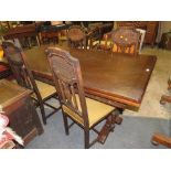 A JACOBEAN OAK SETTLE REFECTORY DRAWLEAF TABLE WITH HEAVY BALUSTER SUPPORTS AND FOUR OAK BERGERE