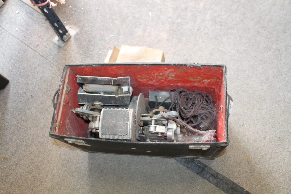 A LARGE VINTAGE PROJECTOR WITH ACCESSORIES TO INCLUDE A J.LIZARS SCREEN