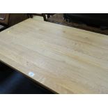 A MODERN LIGHT OAK TRESTLE TYPE TABLE H-75 W-80 L-135 CM