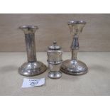 TWO HALLMARKED SILVER CANDLESTICKS, TOGETHER WITH A HALLMARKED SILVER PEPPERETTE (3)
