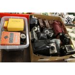 TWO BOXED OF VINTAGE CAMERAS AND ACCESSORIES TO INCLUDE CORONET, NOMO, BROWNIE ETC