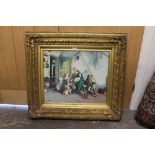 A GILT FRAMED OIL ON BOARD DEPICTING AN INTERIOR SCENE OF A ,FATHER WITH MANY CHILDREN - SIGN MARK
