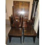 AN UNUSUAL OAK REFECTORY TABLE WITH SIX CHAIRS