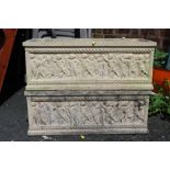 A PAIR OF RECTANGULAR CONCRETE GARDEN PLANTERS WITH RELIEF MOULDED CHILDREN TO THE SIDES, W 62 CM