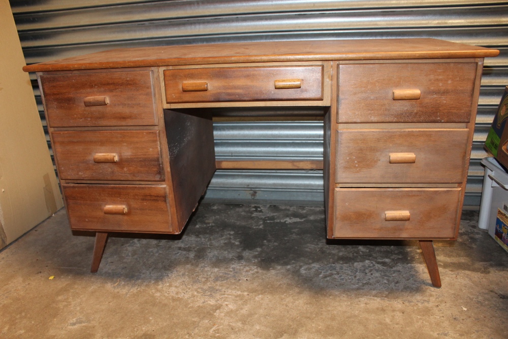 A VINTAGE OAK SEVEN DRAWER DESK - W 123 CM, H 72 CM, D 60.5 M