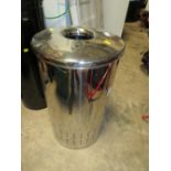 A MODERN CHROME EFFECT LAUNDRY BIN