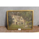 A GILT FRAMED OIL ON BOARD DEPICTING A RUSTIC COTTAGE SCENE WITH FIGURES WITH PORTRAIT STUDY VERSO