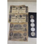 A BAG OF ANTIQUE AND VINTAGE SILVER DOLLAR COINS, TOGETHER WITH A COLLECTION OF REPRODUCTION ANTIQUE