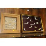 TWO FRAMED CLAY PIPE DISPLAYS
