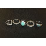 FIVE SILVER DRESS RINGS