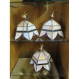 A SET OF THREE TIFFANY STYLE LEADED GLASS CEILING LIGHTS