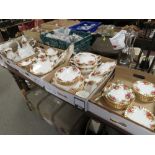 A LARGE QUANTITY OF ROYAL ALBERT OLD COUNTRY ROSES CHINA IN FIVE TRAYS TO INCLUDE TRIOS, TUREENS,