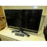AN LG 27" FLATSCREEN TV WITH REMOTE - HOUSE CLEARANCE