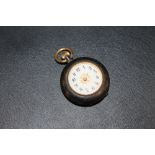 AN ANTIQUE GUN METAL LADIES POCKET WATCH