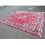 A VERY LARGE PERSIAN WOOLLEN RUG 380 X 292 - A/F REPLACEMENT PATCH