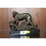 A MODERN BRONZED METAL FIGURE OF A CHEETAH RAISED ON MARBLE PLINTH