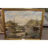 A GILT FRAMED OIL ON CANVAS OF A HARBOUR SCENE WITH BOATS SIGNED W GLYN HEARD LOWER RIGHT