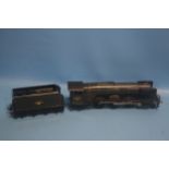 AN UNBOXED BASSET LOWKE 'O' GAUGE FLYING SCOTSMAN THREE RAIL STEAM LOCOMOTIVE WITH TENDER