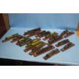 APPROX. TWENTY MODEL TRAINS ON WOODEN PLINTHS