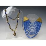 AN AFRICAN GLASS TRADE BEAD COLLARETTE NECKLACE S/D, together with another African bead necklace