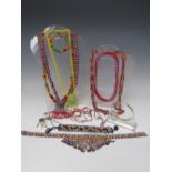 A COLLECTION OF AFRICAN BEAD NECKLACES ETC, together with an African textile necklace and bracelet