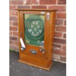 A MODERN ALLWIN NINE CUP PENNY ARCADE MACHINE MADE BY NOSTALGIC MACHINES, mahogany case, made to